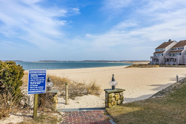 view of water feature with a beach view