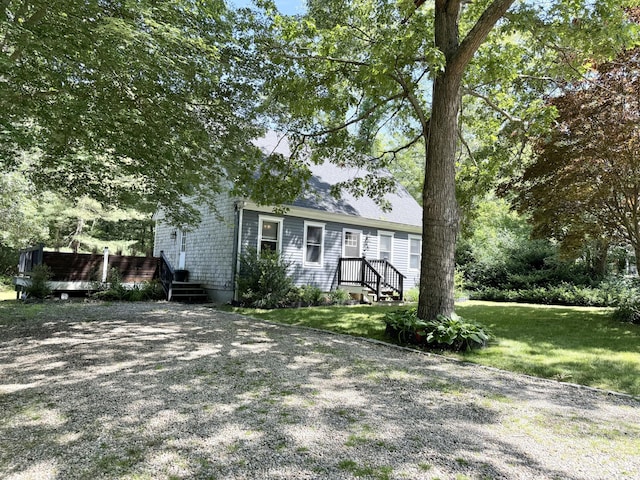 18 Staysail Cir, Marstons Mills, MA 02648 - view of front of home featuring a front yard and a deck