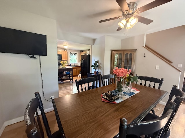 18 Staysail Cir, Marstons Mills, MA 02648 - dining room with ceiling fan and light wood finished floors