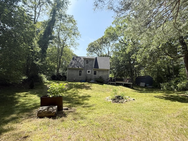 18 Staysail Cir, Marstons Mills, MA 02648 - view of green lawn with a wooden deck