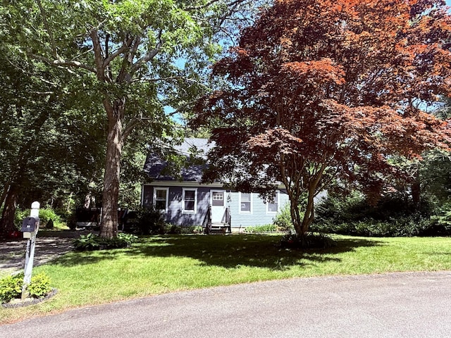 18 Staysail Cir, Marstons Mills, MA 02648 - view of front facade with entry steps and a front lawn