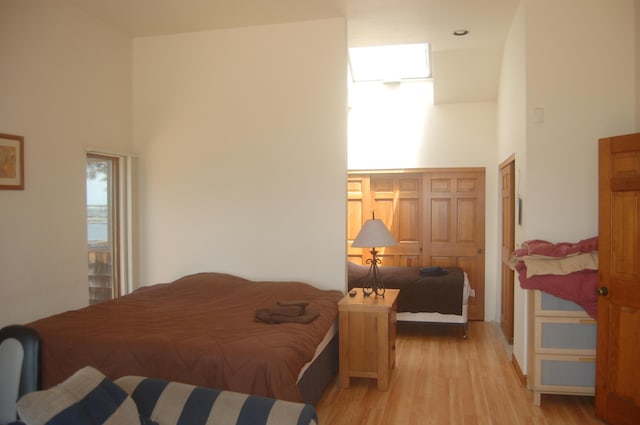 135 Marven Way, Wellfleet, MA 02667 - bedroom featuring light wood-style floors and a high ceiling