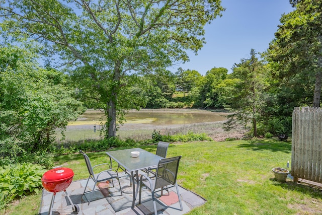 22 Wallace Pt, Buzzards Bay, MA 02532 - view of grassy yard featuring a water view and outdoor dining area