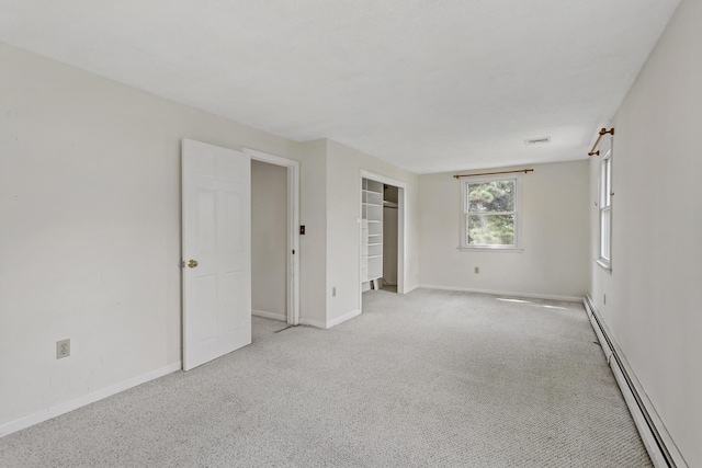 3 Waterside Dr, North Falmouth, MA 02556 - unfurnished bedroom with a baseboard radiator, light carpet, and a closet