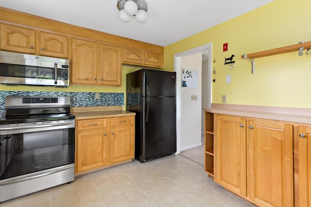 3 Waterside Dr, North Falmouth, MA 02556 - kitchen featuring stainless steel appliances, light countertops, open shelves, and light floors