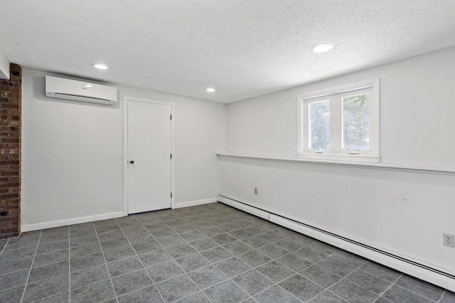3 Waterside Dr, North Falmouth, MA 02556 - below grade area with a wall mounted AC, a baseboard radiator, a textured ceiling, and recessed lighting