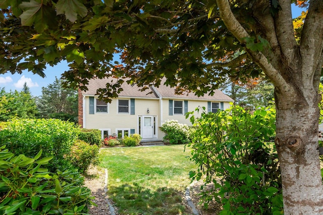 3 Waterside Dr, North Falmouth, MA 02556 - raised ranch featuring a front yard and roof with shingles