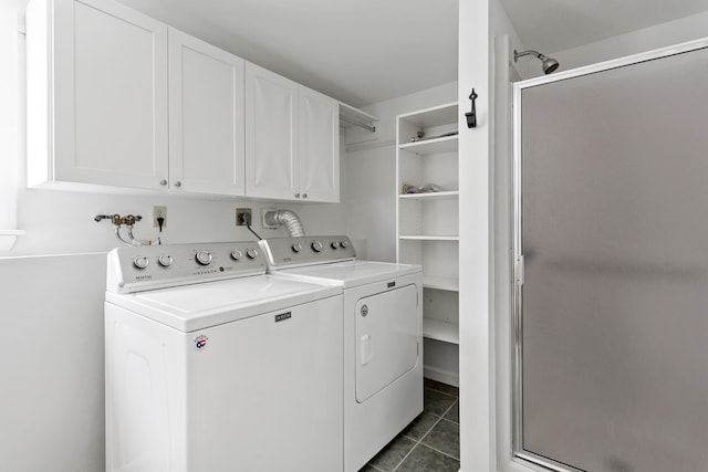 3 Waterside Dr, North Falmouth, MA 02556 - laundry area with washing machine and dryer, cabinet space, and dark tile patterned floors