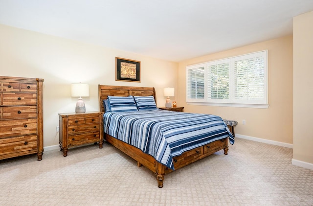 bedroom with light carpet