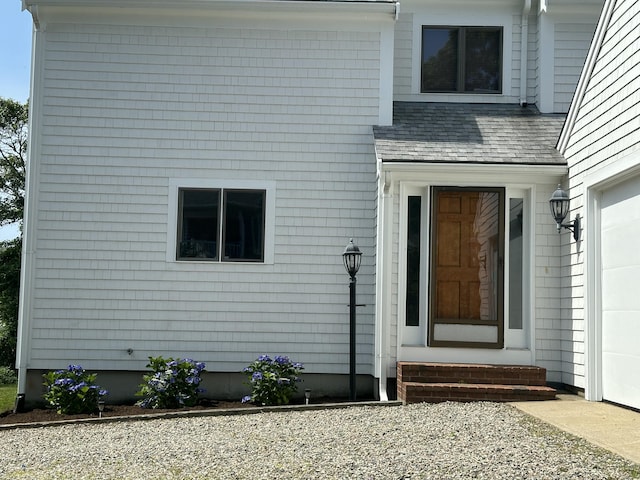 15 Beach St, East Falmouth, MA 02536 - doorway to property featuring a shingled roof