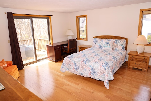 15 Beach St, East Falmouth, MA 02536 - bedroom with wood finished floors and access to exterior