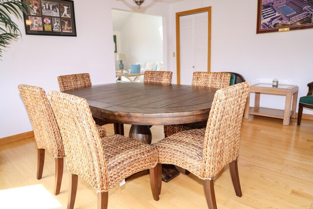 15 Beach St, East Falmouth, MA 02536 - dining space featuring light wood-type flooring and baseboards