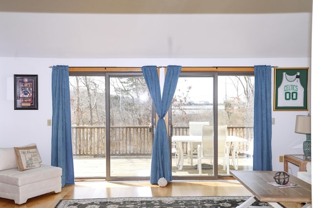 15 Beach St, East Falmouth, MA 02536 - doorway with wood finished floors and healthy amount of natural light