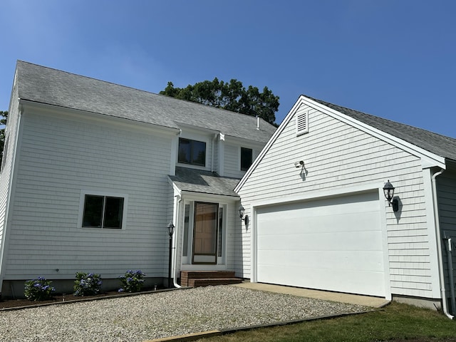 15 Beach St, East Falmouth, MA 02536 - traditional-style home with a garage, driveway, and a shingled roof