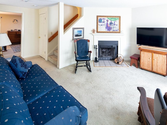 131 Shellback Way Unit T, Mashpee, MA 02649 - carpeted living area with stairs, a fireplace with flush hearth, and baseboards