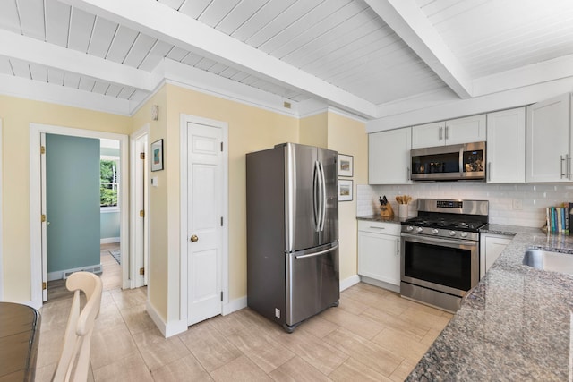 11 White Oak Trl, Centerville, MA 02632 - kitchen featuring appliances with stainless steel finishes, tasteful backsplash, beam ceiling, wooden ceiling, and white cabinets
