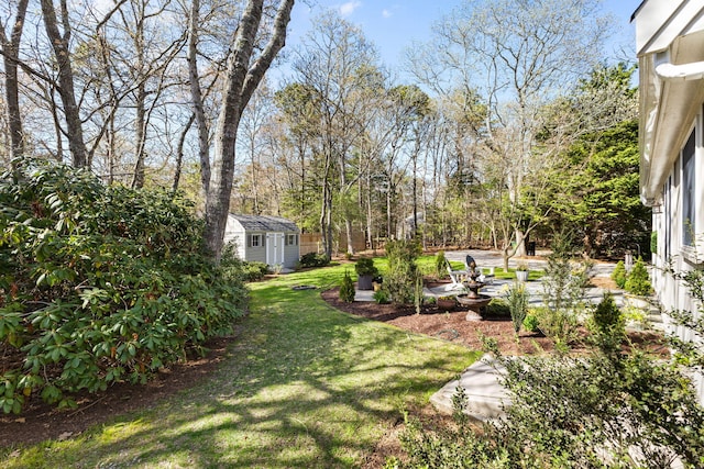11 White Oak Trl, Centerville, MA 02632 - view of grassy yard with a storage shed and an outdoor structure