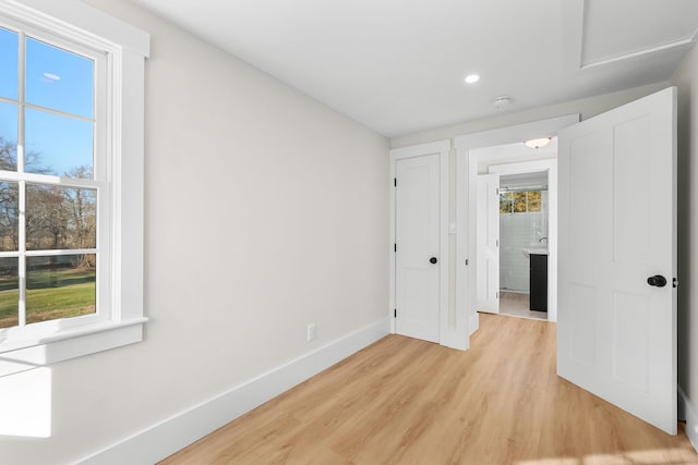 unfurnished bedroom with light hardwood / wood-style flooring