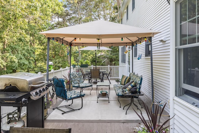 43 Owl Pond Rd, Brewster, MA 02631 - view of patio with area for grilling, a gazebo, outdoor dining space, an outdoor living space, and a wooden deck