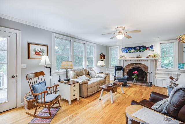 43 Owl Pond Rd, Brewster, MA 02631 - living area featuring a brick fireplace and ornamental molding