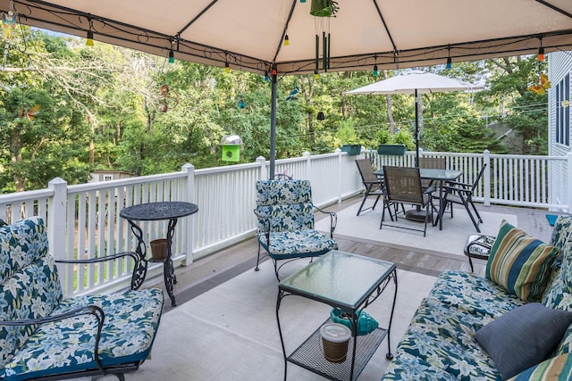 43 Owl Pond Rd, Brewster, MA 02631 - view of patio with outdoor dining area, a gazebo, and view of scattered trees