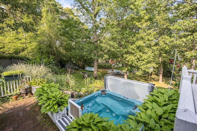 43 Owl Pond Rd, Brewster, MA 02631 - view of swimming pool with a hot tub