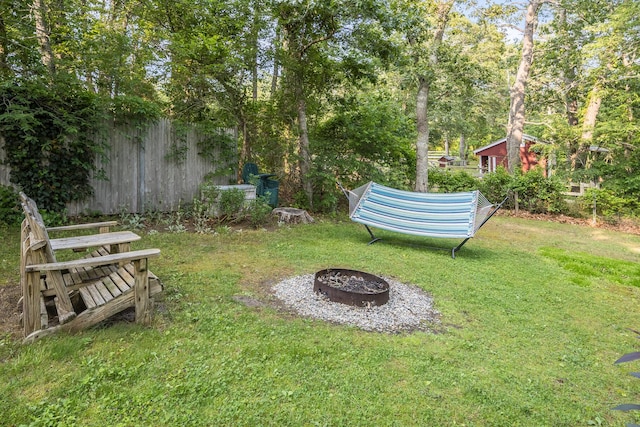 43 Owl Pond Rd, Brewster, MA 02631 - view of green lawn with a fire pit