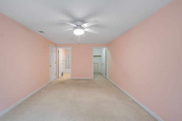 15 Pebble Beach Ave, Mashpee, MA 02649 - spare room featuring a ceiling fan and light carpet