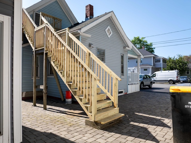 352 Bishop St, Framingham, MA 01702 - rear view of house featuring stairs