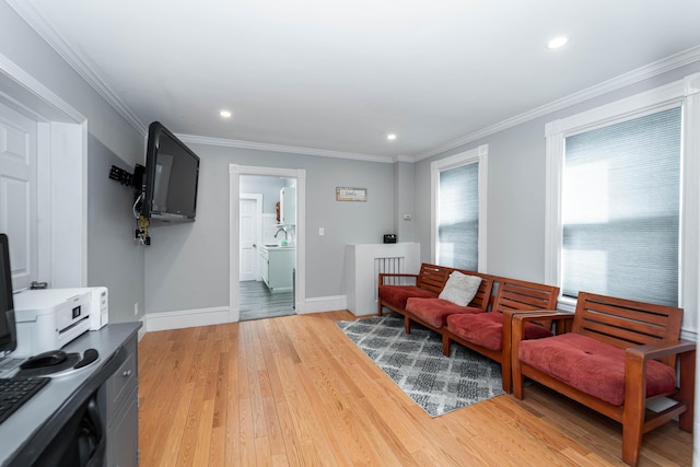352 Bishop St, Framingham, MA 01702 - living room with light wood-style floors, recessed lighting, crown molding, and baseboards