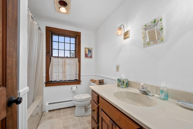 bathroom featuring a baseboard radiator, toilet, wainscoting, vanity, and shower / bathtub combination with curtain