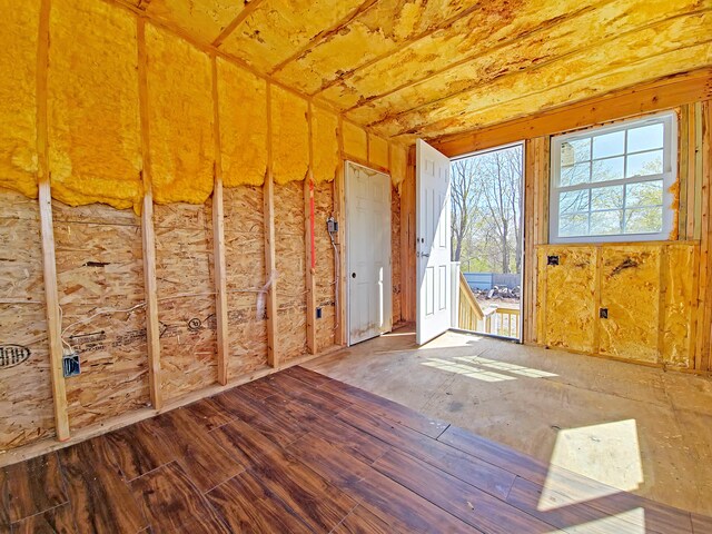 23 Old Barnstable Rd, East Falmouth, MA 02536 - interior space featuring wood ceiling, exterior fireplace, concrete floors, and lofted ceiling