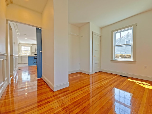 23 Old Barnstable Rd, East Falmouth, MA 02536 - empty room with baseboards, light wood-style flooring, and visible vents