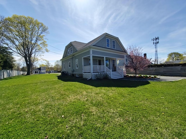 23 Old Barnstable Rd, East Falmouth, MA 02536 - exterior space with a front lawn, fence, and covered porch