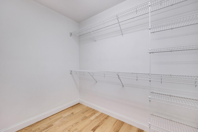 13 Laurel Hill Ct, Bourne, MA 02532 - spacious closet with wood finished floors