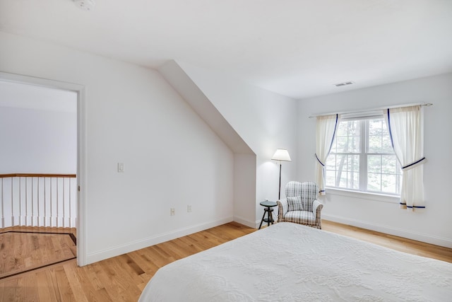 13 Laurel Hill Ct, Bourne, MA 02532 - bedroom with light wood finished floors and baseboards
