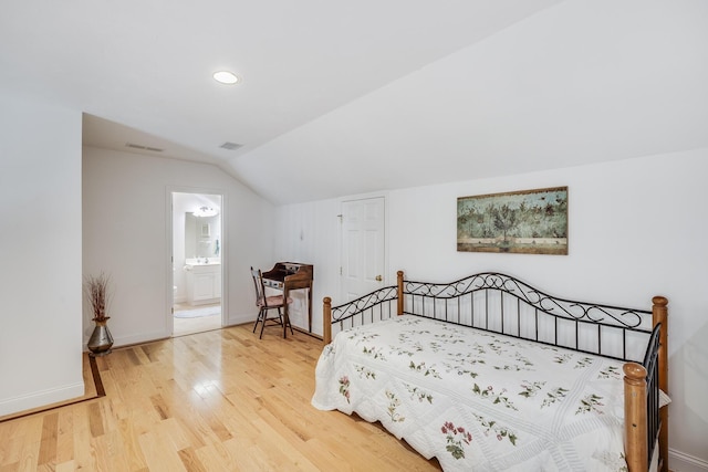 13 Laurel Hill Ct, Bourne, MA 02532 - bedroom featuring vaulted ceiling, light wood finished floors, baseboards, ensuite bathroom, and recessed lighting