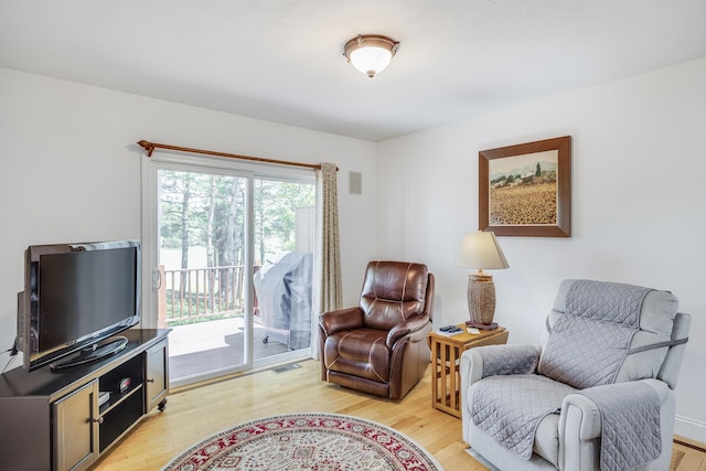 13 Laurel Hill Ct, Bourne, MA 02532 - sitting room with light wood-type flooring