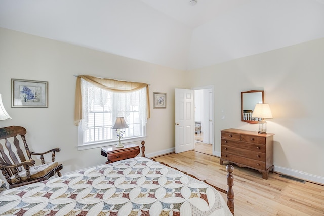 13 Laurel Hill Ct, Bourne, MA 02532 - bedroom featuring wood finished floors, high vaulted ceiling, and baseboards