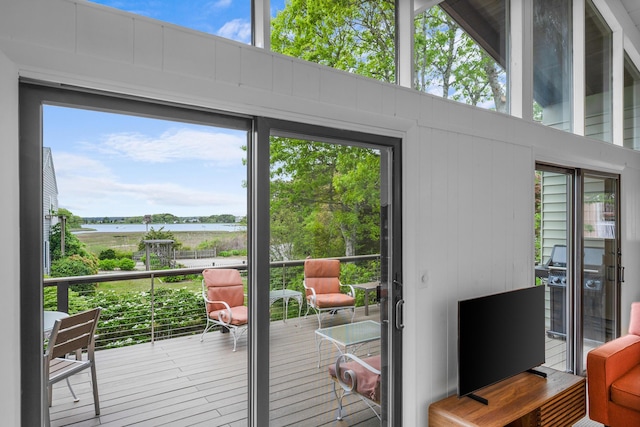 128 Whippoorwill Cir, Mashpee, MA 02649 - doorway to outside featuring wood finished floors