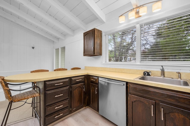 128 Whippoorwill Cir, Mashpee, MA 02649 - kitchen featuring dishwasher, a sink, a peninsula, light wood finished floors, and light countertops