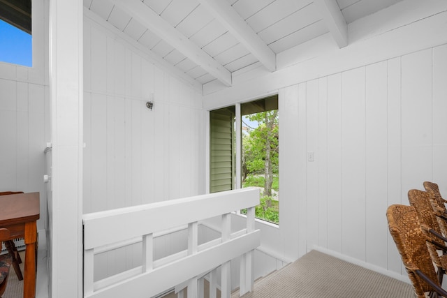 128 Whippoorwill Cir, Mashpee, MA 02649 - stairway with beam ceiling and wood walls