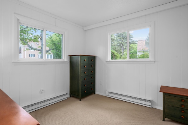 128 Whippoorwill Cir, Mashpee, MA 02649 - unfurnished bedroom featuring a baseboard radiator and light carpet