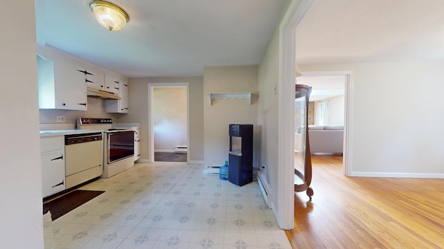 10 Freeman Rd, Yarmouth Port, MA 02675 - kitchen featuring white appliances, white cabinetry, under cabinet range hood, light countertops, and a baseboard radiator