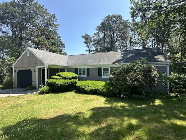 10 Freeman Rd, Yarmouth Port, MA 02675 - single story home featuring an attached garage, driveway, and a front yard