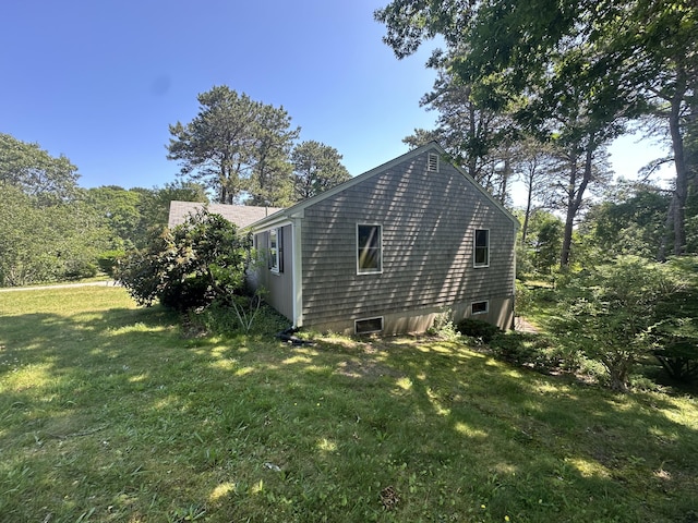 10 Freeman Rd, Yarmouth Port, MA 02675 - view of property exterior featuring a lawn
