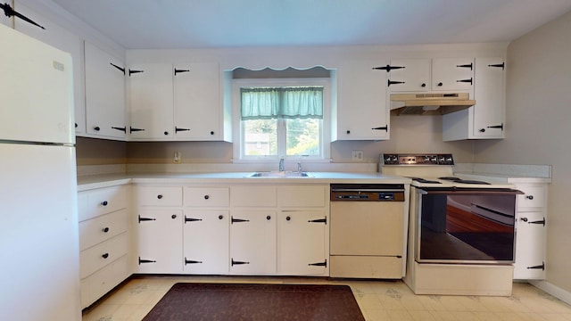 10 Freeman Rd, Yarmouth Port, MA 02675 - kitchen with white appliances, under cabinet range hood, light countertops, and white cabinets