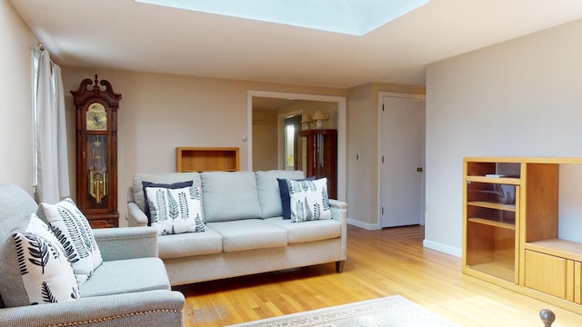 10 Freeman Rd, Yarmouth Port, MA 02675 - living room with light wood-style flooring and a skylight
