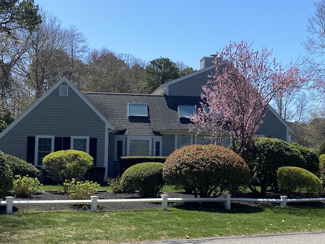 4 Square Rigger Ln, Hyannis, MA 02601 - view of front of home featuring a chimney and a front lawn