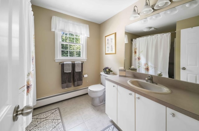 4 Square Rigger Ln, Hyannis, MA 02601 - bathroom featuring baseboard heating, vanity, and tile patterned flooring